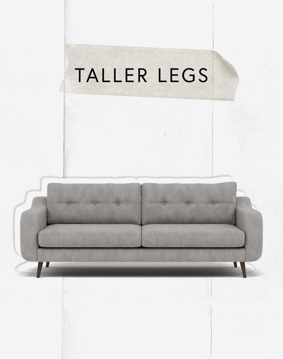 A grey sofa with taller legs